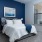 spacious bedroom with window to private balcony