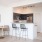 track lighting in kitchen with serving counter